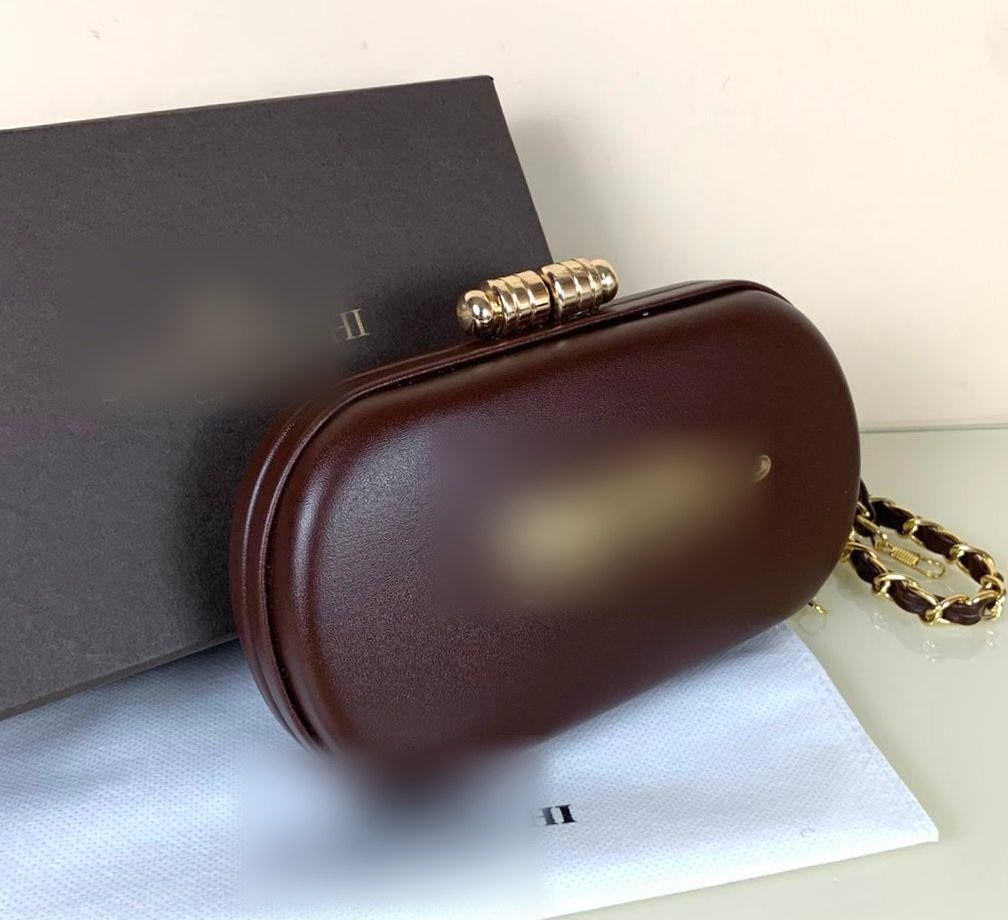 Sabyasachi Clutch- Leather Covering